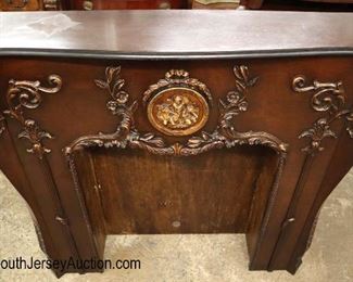 Lot 604
NICE semi antique carved and fancy fireplace mantle with cherub medallion