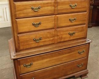 Lot 605
Drew Furniture SOLID cherry bracket foot 6 drawer chest on chest