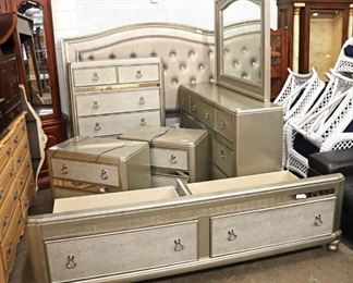 Lot 688: Coaster Furniture 6 piece Like New with tags polychrome style with decorative mirrors and upholstered king size jeweled button tuft headboard and under the bed storage bedroom set with rails and hardware - night stand has USB chargers - one night stand has water bubble - all decorative mirrors are good
Dimensions: bed 80" w x 66" h x 90" l low chest 64" l x 77" h with mirror x 18" d with out mirror 36" h high chest 37" w x 50" h x 17" d night stands 29" w x 24" h x 17" d