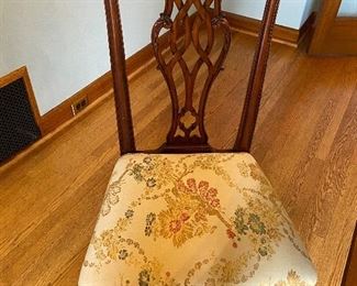 One of the four dining chairs Chippendale.  