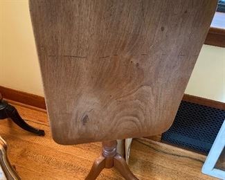 Antique table shown flipped up