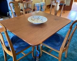 Pedestal flip top table 42" x 48" x 29.5"h sold in next photo chairs sold separately for $150 for 6 one of them as found