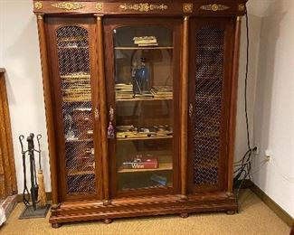 Antique French bookcase signed by the artist on the back.  Chicken wire in side doors, glass in the middle.  63"w x 60"h x 20"d.  $900 obo 