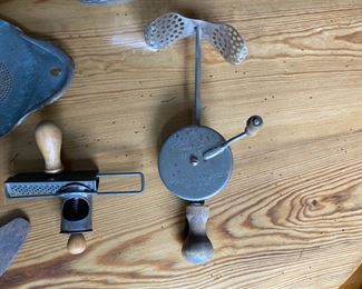 Collection of vintage kitchen utensils                         45.00    (wooden knob comes off of nutmeg grater)
