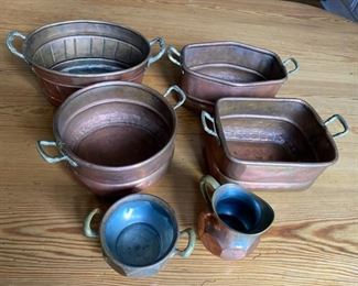 Collection of copper items including creamer & sugar Largest piece measures 4"H x 9 3/4"L x 6 1/4w    95.00                                        