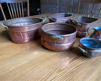 Collection of copper items including creamer & sugar Largest piece measures 4"H x 9 3/4"L x 6 1/4w    95.00                                        