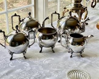 Reed and Barton silver plate tea set                       225.00     Height of coffee pot 7 1/2"h                                
