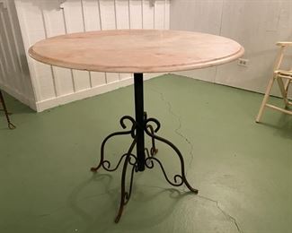 Marble top iron bistro table                                         225.00              29"h x 34" diameter    