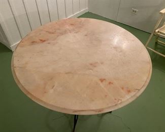 Marble top iron bistro table                                         225.00   29"h x 34" diameter 
