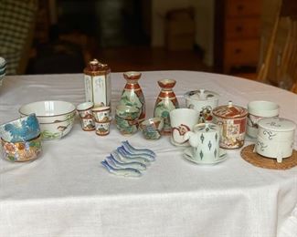 Collection of Japanese articles. Tallest piece measures 6"    2 white & rust sake cups are chipped                 225.00                                                                     