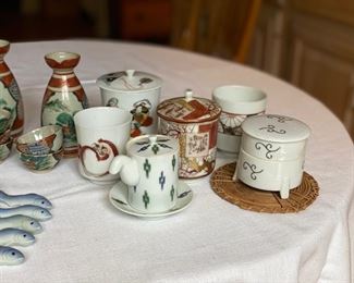Collection of Japanese articles. Tallest piece measures 6"    2 white & rust sake cups are chipped                 225.00                                                                     