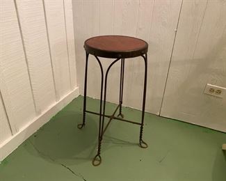 Antique iron and wood stool 24"h x 12" dia      50.00