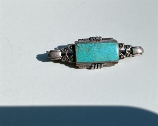 Small silver & turquoise brooch      1 1/2"L                  18.00             