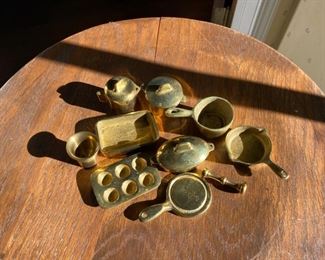 collection of miniature brass cookware                