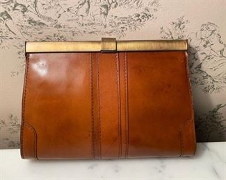 Vintage leather clutch                                                    20.00         6 3/4"h x 9 3/4"w   