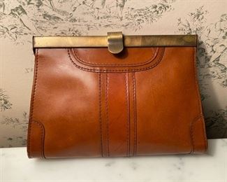 Vintage leather clutch                                                    20.00         6 3/4"h x 9 3/4"w          