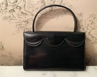 Vintage Saks Fifth Avenue  handbag                     20.00              5 1/2"h x 8 1/2" w (not including handle) lining torn