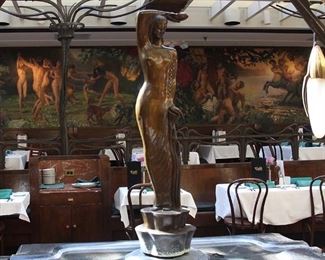 Cast Bronze Art Deco Statues
56" X 14" X 14"
Heavy and well-made

The original was displayed at Clyde's restaurant in Tysons Corner, Virginia for nearly 40 years.

The original terra cotta statue was designed by George Stanley (an American sculptor who designed the Academy Award of Merit, also known as the Oscar, and the Muse Statue at the Hollywood Bowl) and was purchased from Georgetown's Inglett-Watson Antique Dealers. It was the centerpiece of an Art Deco water display in the Palm Terrace dining room at the former Clyde's of Tysons Coner (1980-2017). In the mid-80s, a customer fell into the pond while dancing, breaking the statue into many pieces. Repaired by a local company used by the Smithsonian, the resulting statue was near perfect. Five bronze statues were cast from the original sculpture, and several have been in storage since that time.