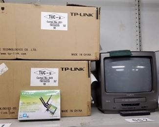 2 Boxes Of TP-Links, Broksonic TV, Brother Typewriter, Paper Cutter, Portable Chalkboard