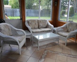 6 pc White wicker patio set. Glass topped tables