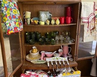 Mid Century Curio Cabinet..FILLED in the Kitchen!! Printed Vintage Linens, Green Glass, Red Thermos/Cups, Mid Century Pink Harmony Daisy Chain, FUN STUFF..