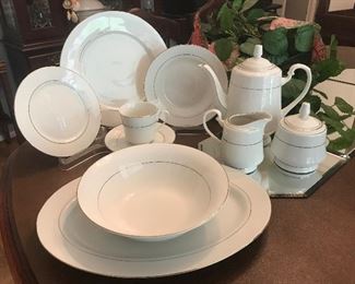 Royal Majestic Fine China Set: 8- 7.5" dessert plates; 11- cups 3 1/8"; 8 -saucers; 8-dinner plates 10.5"; 8- rimmed soup bowls 7 7/8"; 1- rd veg. bowl 9"; Coffee Pot, Cream/sugar dishes; 1 platter 14.25"
