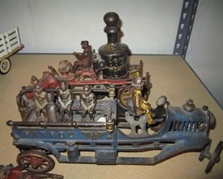 CAST IRON FIRE TRUCK AND MEN