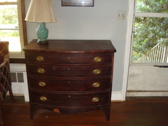 Mahogany swell front chest, Asian table lamp