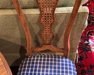 Detailed wood back and upholstered seat