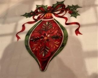 The salad plates have different ornaments.