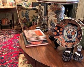 One of two demilune, straight legged tables