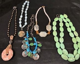 Some of the MANNNNNNNY pieces of costume jewelry