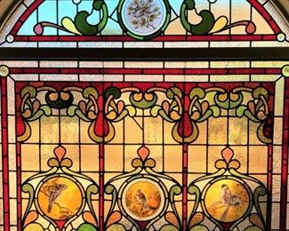 Check out the incredible stain glass in the master bathroom. (Sorry, it stays with the house!)