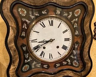 Clock with mother-of-pearl
