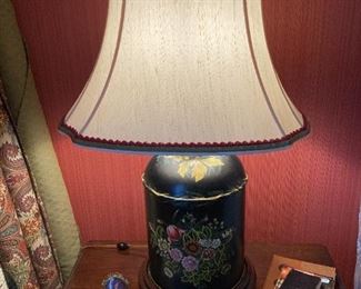 One of two tole lamps