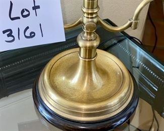 Lot 3161. $225.00  Wildwood Lamp made of Vintage Brass Double Light on top with 2 Candle Lamp arms.   The pleated shade is in a bit of rough shape. The finial is goofy, probably could use a new shade.  The lamp measures about 24" tall and the shade is 15" wide.  The lamp itself is great! A comparable Wildwood lamp new runs $1,100+.  Crazy!