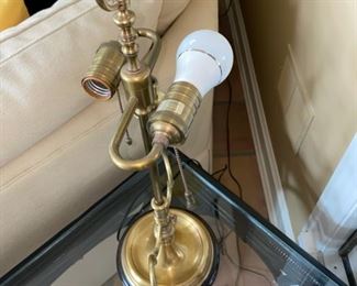 Lot 3161. $225.00  Wildwood Lamp made of Vintage Brass Double Light on top with 2 Candle Lamp arms.   The pleated shade is in a bit of rough shape. The finial is goofy, probably could use a new shade.  The lamp measures about 24" tall and the shade is 15" wide.  The lamp itself is great! A comparable Wildwood lamp new runs $1,100+.  Crazy!