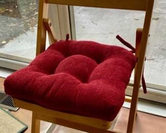 Lot 3168. $250.00  Set of 10 wood folding chairs with red cushions 30" to back x 19" to seat x14" D  x 14" W