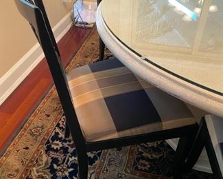 Lot 3173. $2,600.00 Fabulous Remi Lugano Limestone table with custom beveled glass top and 6 "Emerson et Cie" Dining Chairs.   (The Company's name had its origin in the French tradition of adding "et Cie" to indicate a family-owned business,  and this six-generation company moved to High Point, NC.  to take advantage of the skilled labor force for furniture building.)  The owner paid $2,350  for the table alone, an additional $1,000 for the custom cut beveled glass)  and the six chairs with custom upholstery were no doubt a fortune, as nothing from Emerson et Cie is cheap!  The table measures 58" round x 30"H; Chairs: 37"H to back, 21"W x 19"D x 20" H to seat.   You will need to have professionals move it for you.  The table is in two pieces plus the glass. 