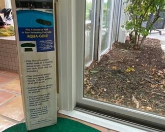 Lot 3167. $25.00 Aqua Golf Play-a-round of Golf in your swimming pool.  Includes: 3'x5' floating green & 18" x 24" chipping mat. 		