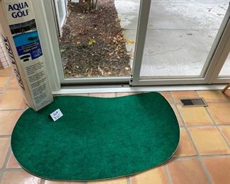 Lot 3167. $25.00 Aqua Golf Play-a-round of Golf in your swimming pool.  Includes: 3'x5' floating green & 18" x 24" chipping mat. 		