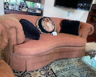 Lot 3175. 	$650.00 C.R. Laine in Hickory, N.C. Kidney Shaped Sofa was $2000 new! In a heathered rust color. 92"w 48"d x 35"t 18" seat height. This room is typically very sunny, and the tops of the sofa are a tad faded, but not problematic.  