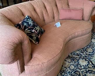 Lot 3175. 	$650.00 C.R. Laine in Hickory, N.C. Kidney Shaped Sofa was $2000 new! In a heathered rust color. 92"w 48"d x 35"t 18" seat height. This room is typically very sunny, and the tops of the sofa are a tad faded, but not problematic.  