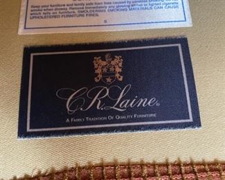 Lot 3175. 	$650.00 C.R. Laine in Hickory, N.C. Kidney Shaped Sofa was $2000 new! In a heathered rust color. 92"w 48"d x 35"t 18" seat height. This room is typically very sunny, and the tops of the sofa are a tad faded, but not problematic.  