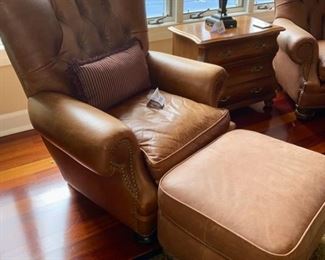 Lot 3182. $525.00  1 of 2 Classic Leather Chair and Ottoman with nailhead trim detail. Was $1950 new! Medium Brown	chair: 40"H to back x 29"D x 39"W  Seat: 19"H x 20"W x 22"D;  Ottoman: 22"w x 21"x 17"H	Note that the ottoman is quite faded and worn, however, there is a product on the market that will restore this leather to its original luster.  Set looks better than what it looks like in this bright location.  