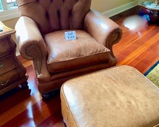 Lot 3183. $525.00   2 of 2 Classic Leather Chair and Ottoman with nailhead trim detail. Was $1950 new! Medium Brown	chair: 40"H to back x 29"D x 39"W  Seat: 19"H x 20"W x 22"D;  Ottoman: 22"w x 21"x 17"H	Note that the ottoman is quite faded and worn, however, there is a product on the market that will restore this leather to its original luster.  Set looks better than what it looks like in this bright location.  