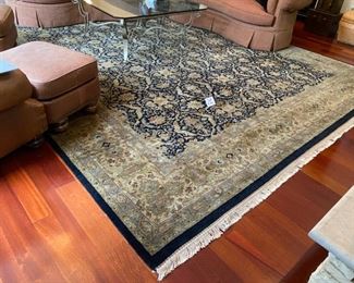 Lot 3186. $3,200.00   Jaipur Wool Rug, navy, tan, teal, excellent shape! Has a beautiful sheen. Owner Paid $7800 for the rug! 12' x 15'	