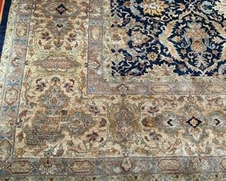 Lot 3186. $3,200.00   Jaipur Wool Rug, navy, tan, teal, excellent shape! Has a beautiful sheen. Owner Paid $7800 for the rug! 12' x 15'	