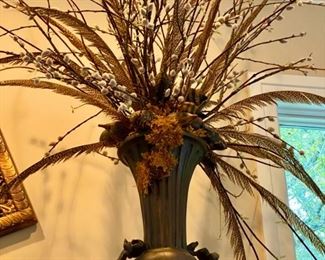 Lot 3192. $175.00  Floral Design w/pussy willows and feathers! Makes a terrific statement. The owners have this on the fireplace, but it would look just as stately on a stand or even on the floor or the fireplace hearth.  Roughly 65" H.   As an aside, my daughter (who works with us) was about 4 years old and apparently unbeknownst to us, stuck a pussy willow up her nose.  Honest to goodness, we had no idea until it started sprouting!  We had to take her to the doctor to have it removed and when asked why she put it up her nose, she replied, "Because it was soft."  I know, TMI, but I can't stop thinking of this event when I see pussy willows, lol! This piece is really stunning with feathers and more.  SAID DAUGHTER DOES NOT APPROVE OF THIS CAPTION!