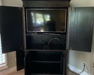 Lot 3211 $750.00  Demilune Media Center 78" H x 24" D x 44" W	 This a compact Media Center that is Beautiful and matches Lots 3207 and 3210.  TV is not for sale.
